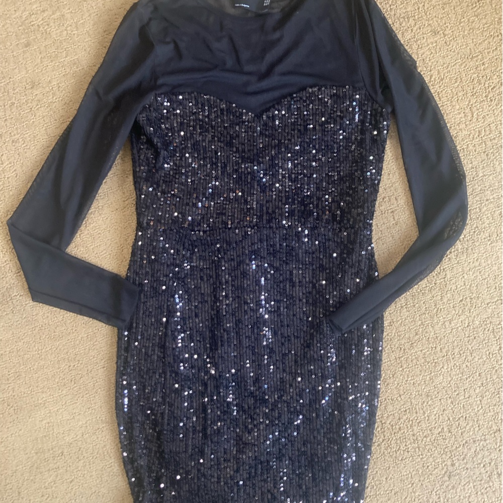 Black party dress. Only work once. Ladies size 6. Great condition